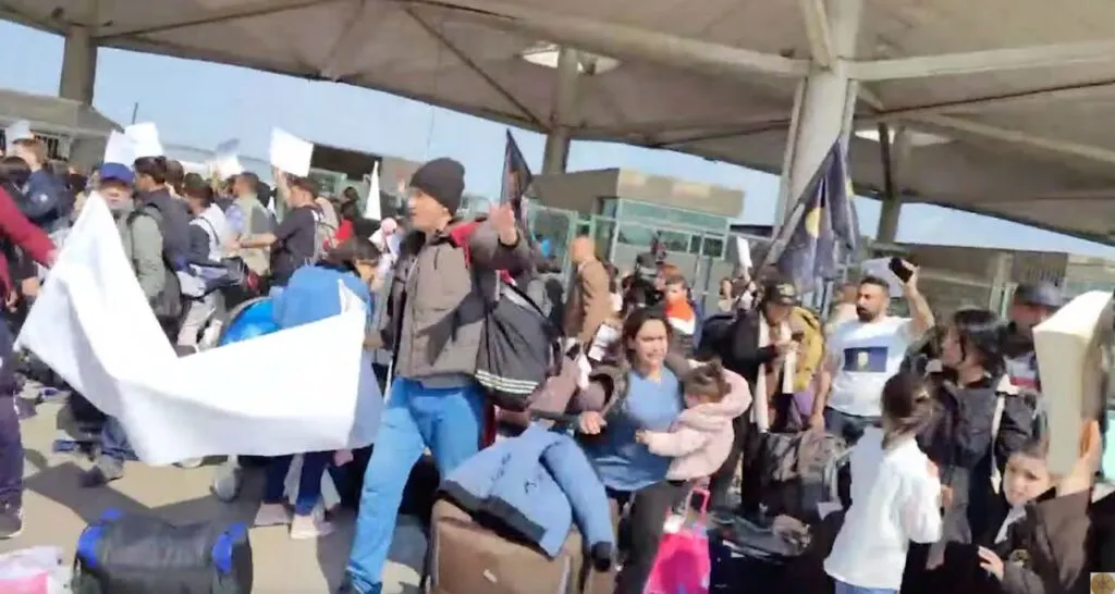 Ahmadi refugees at the airport