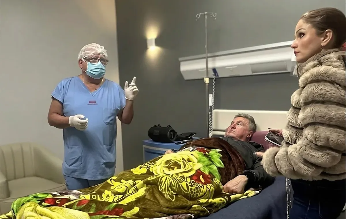 Rudnev and his wife at the hospital